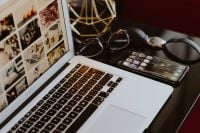 Kaboompics - Dark Home Office Flat Lay with Laptop, Phone, Glasses and Watch