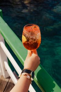 Kaboompics - Close Spritz beside Green Railing and Dark Water