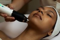 Kaboompics - Facial Device Treatment Along Jawline and Neck