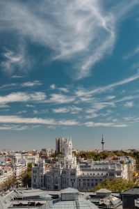 Kaboompics - Vertical Palacio de Cibeles Cityscape with Rooftop Tower and Layered Clouds
