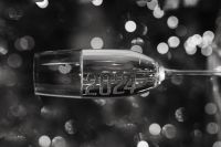 Kaboompics - Champagne Flute With Glittering 2024 Numbers And Festive Bokeh