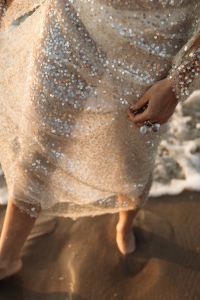 Kaboompics - Sequin Dress and Statement Rings at the Beach