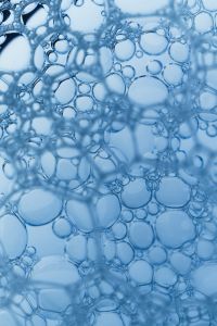 Kaboompics - Large Blue Soap Bubbles in Dense Vertical Macro Foam Texture, Abstract Water Background