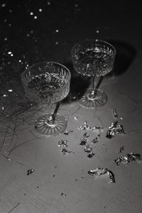 Kaboompics - Two Coupe Glasses With Confetti In Black And White
