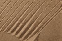 Kaboompics - Diagonal Sand Ridges and Wave Patterns