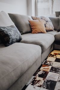 Kaboompics - Scandinavian decorative pillows on modern sofa