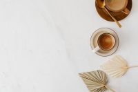 Kaboompics - Coffee & Dried Palm Leaves on Marble