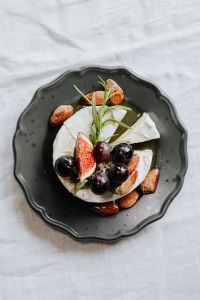 Kaboompics - Camembert Board with Figs and Grapes, White Linen Copy Space