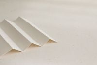 Kaboompics - Folded White Paper Strip on Neutral Background