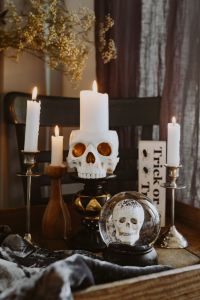 Kaboompics - Halloween Skull Candle and Crystal Skull Ball with Candles