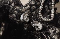Kaboompics - Silver Earrings and Necklace on Black Driftwood