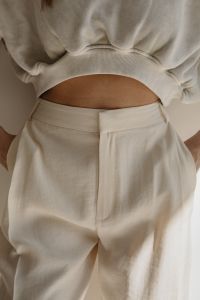 Kaboompics - White Sweatshirt and Wide-Leg Trousers Fashion Detail