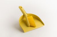 Kaboompics - Yellow Dustpan and Brush on White Background