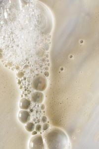 Kaboompics - Neutral Beige Skincare Foam Macro with Copy Space
