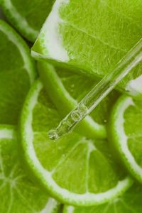 Kaboompics - Fresh Lime Slices with Glass Pipette Close-Up