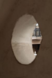 Kaboompics - Architectural Archway Framing Balcony with Ornate Railing