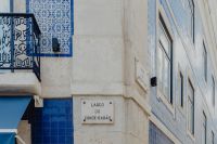 Kaboompics - Blue and White Azulejo Corner with Largo do Conde-Barão Street Sign