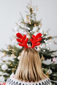 Kaboompics - Woman in Reindeer Antlers in Holiday Setting