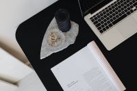 Kaboompics - Overhead Home Office Flat Lay with Laptop, Black Candle, Marble and Open Magazine