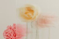 Kaboompics - Soft Pink and Golden Flowers Through Ribbed Glass, Horizontal Neutral Floral Background