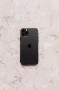 Kaboompics - Apple iPhone 11 Pro on Pink Marble with Copy Space