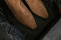 Kaboompics - Close Up of Tan Suede Boots in a Box for Fall Fashion Unboxing