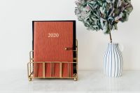 Kaboompics - 2020 Planner and Hydrangeas in a Striped Vase on Marble