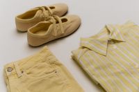 Kaboompics - Yellow Shorts, Beige Flats and Striped Shirt Flat Lay
