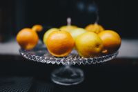 Kaboompics - Whole Oranges on a Cut Crystal Pedestal Platter