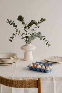 Kaboompics - Eucalyptus Vase And Pastel Eggs On Easter Table