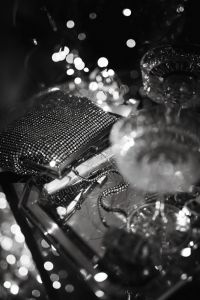 Kaboompics - Black and White New Year's Eve Table with Champagne and Disco Ball