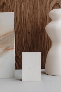 Kaboompics - White Ceramic Vase and Marble Sample beside Blank Card, Neutral Branding Mockup