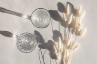 Kaboompics - Close-Up Overhead Still Life of Crystal Glasses and Dried Bunny Tails