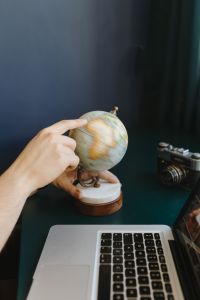 Kaboompics - Male Finger Showing A Part Of The World On An Globe