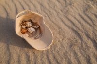 Kaboompics - Bucket of Seashells on the Beach