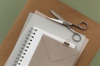 Kaboompics - Editorial Paper Stationery Composition with Envelope Notebook and Scissors
