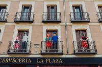 Kaboompics - Madrid Facade with Mannequins on Iron Balconies and Shuttered Windows