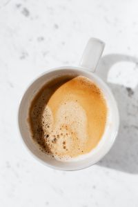 Kaboompics - Close-Up Coffee Cup on Speckled White Marble