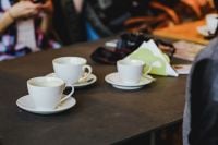Kaboompics - White cups of coffee on a table