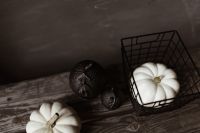Kaboompics - White Pumpkins and Black Halloween Decor on Wood