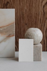 Kaboompics - Blank Vertical Business Card with Stone Sphere and Pedestal, Marble and Wood Mockup