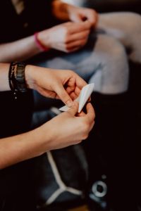 Kaboompics - Close-Up of Workshop Participants Folding Paper Together