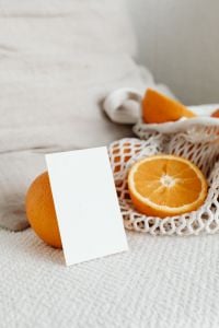 Citrus Business Card Mockups and Reusable Mesh Produce Bags on Neutral Linen