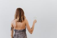 Kaboompics - Woman with a Drink at a Festive New Year's Party