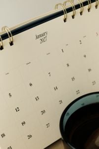 Kaboompics - January 2027 Desk Calendar With Green Tea Close Up