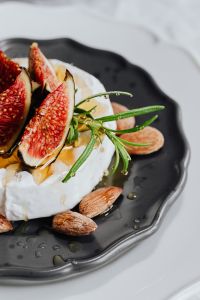 Kaboompics - Portrait Camembert and Fig Plate with White Copy Space