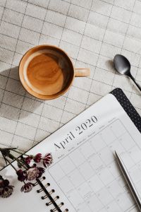 Kaboompics - April 2020 Planner, Coffee and Astrantia Flat Lay with Spoon and Pencil