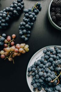 Kaboompics - Grape and Blackberry Arrangement on Dark Wood