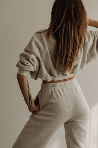 Kaboompics - Woman Seen from Behind in Neutral Joggers and Sweatshirt
