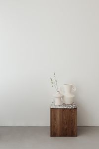 Kaboompics - Pantone Color of the Year 2026: White Ceramics on a Wooden Pedestal